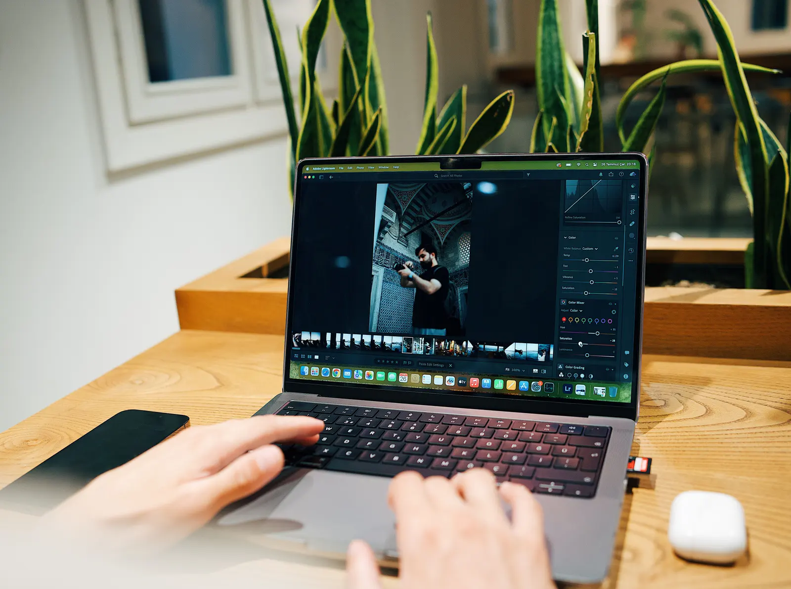 Images being uploaded from a laptop after a shoot