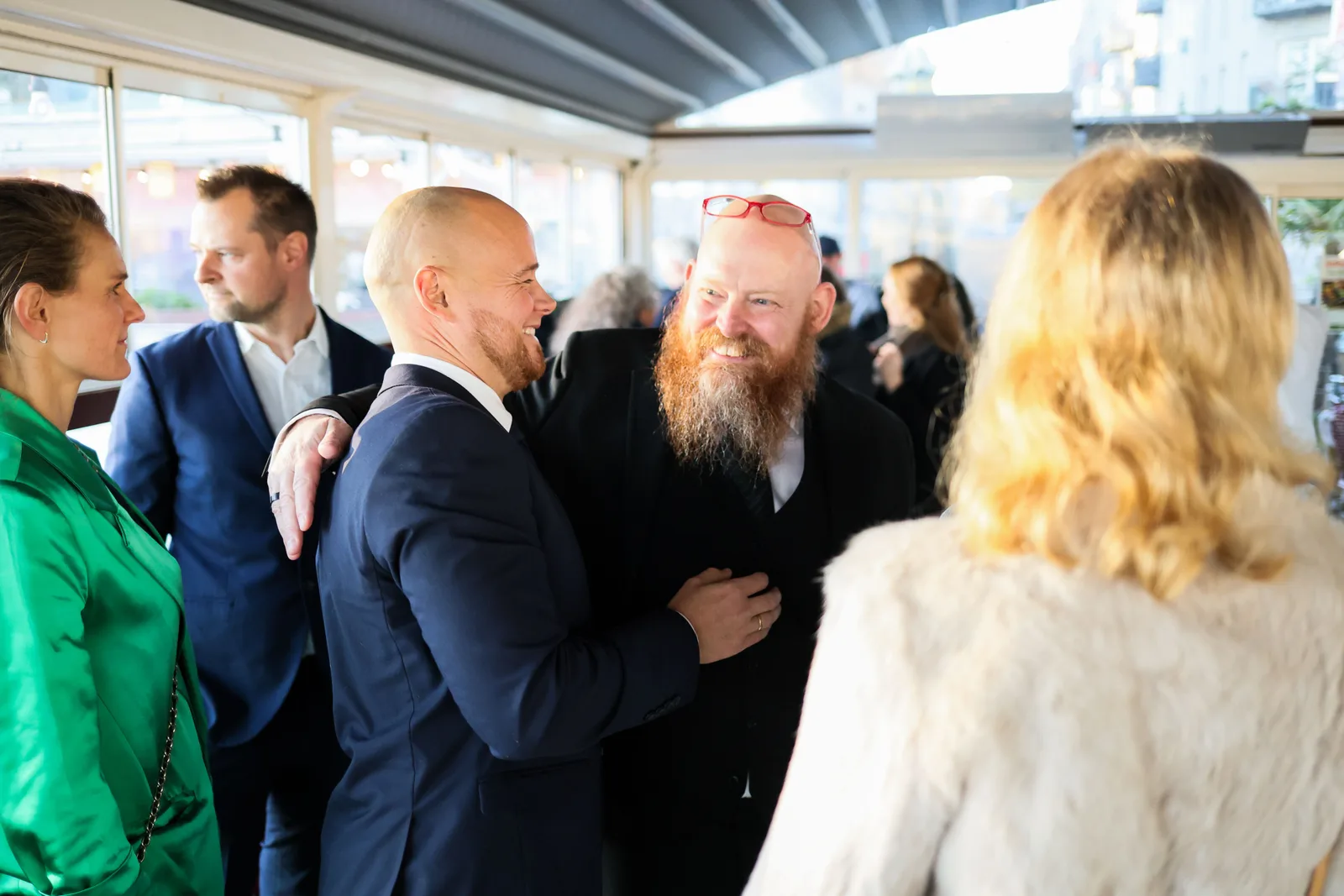 Guests talking during a break at an event