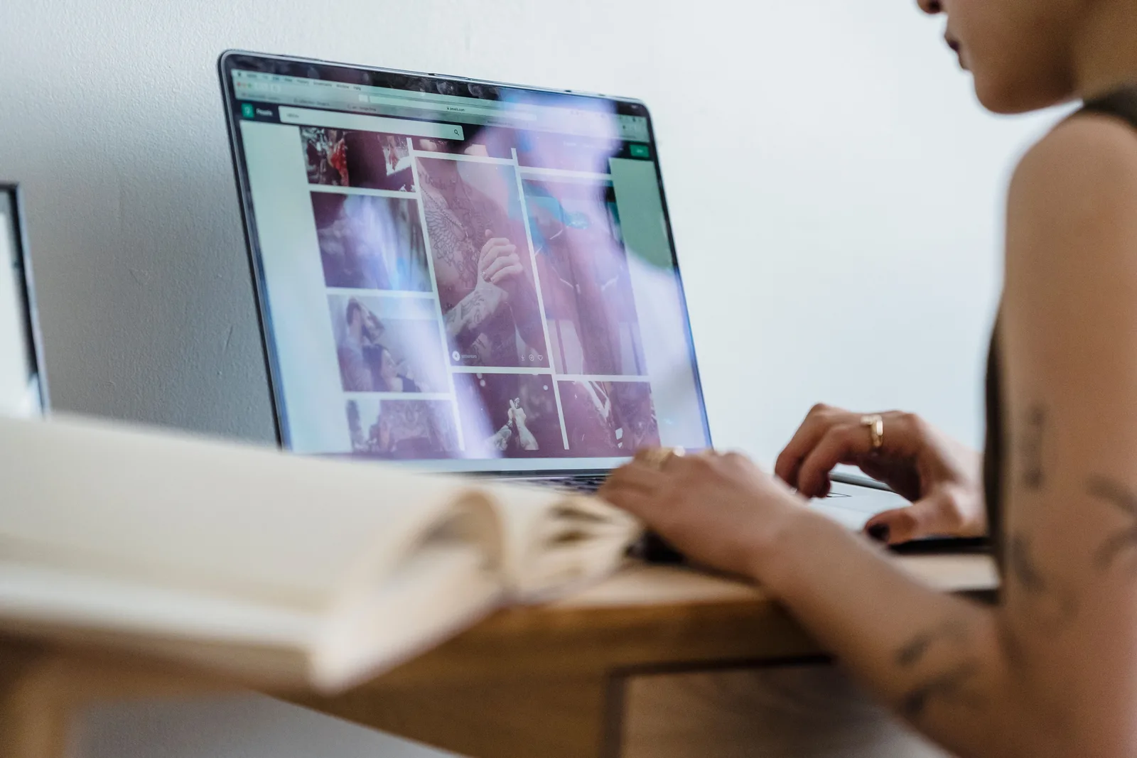 A client looking through their gallery on a laptop