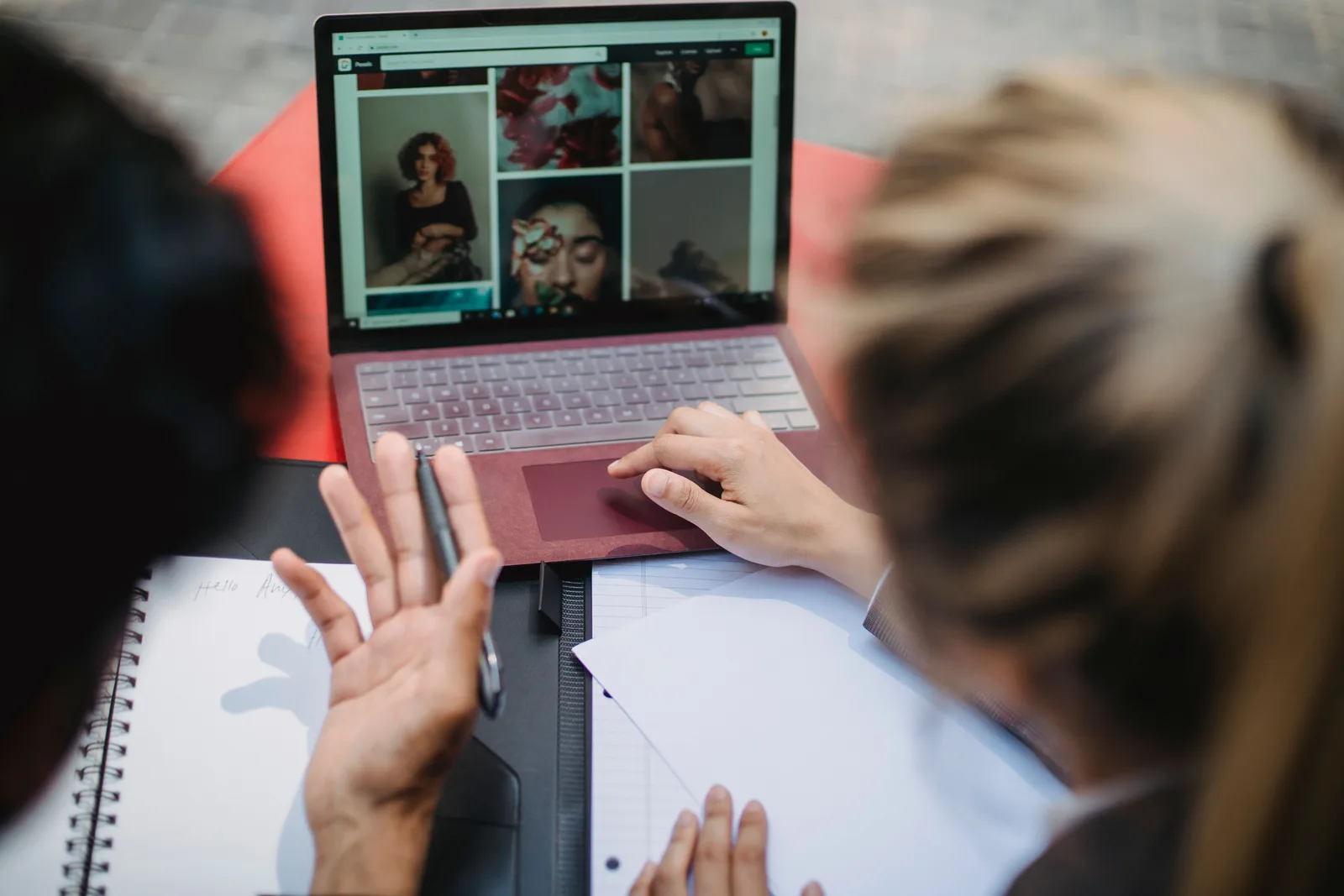A photography website open on a laptop