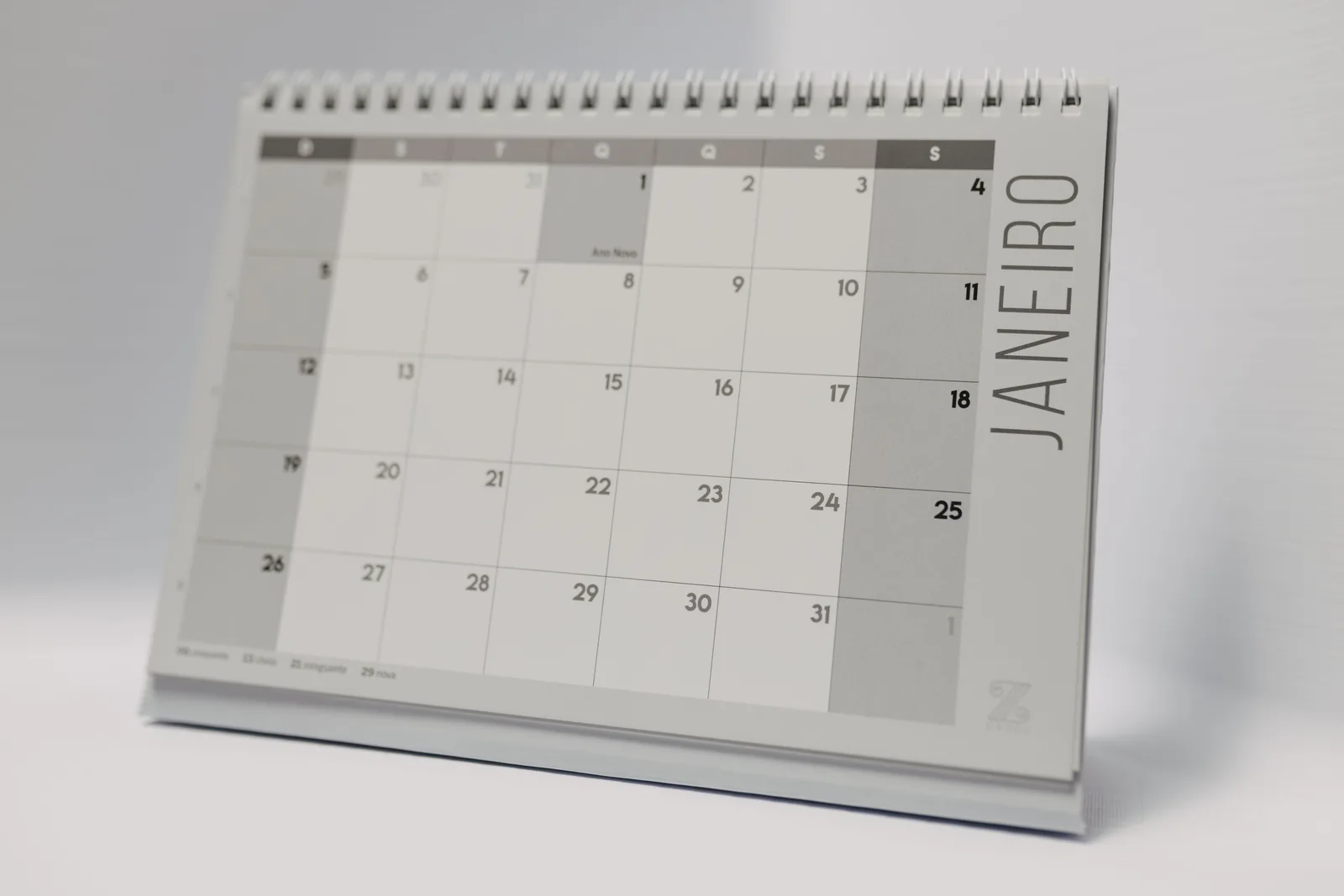 A blank desk calendar standing open at the start of the year