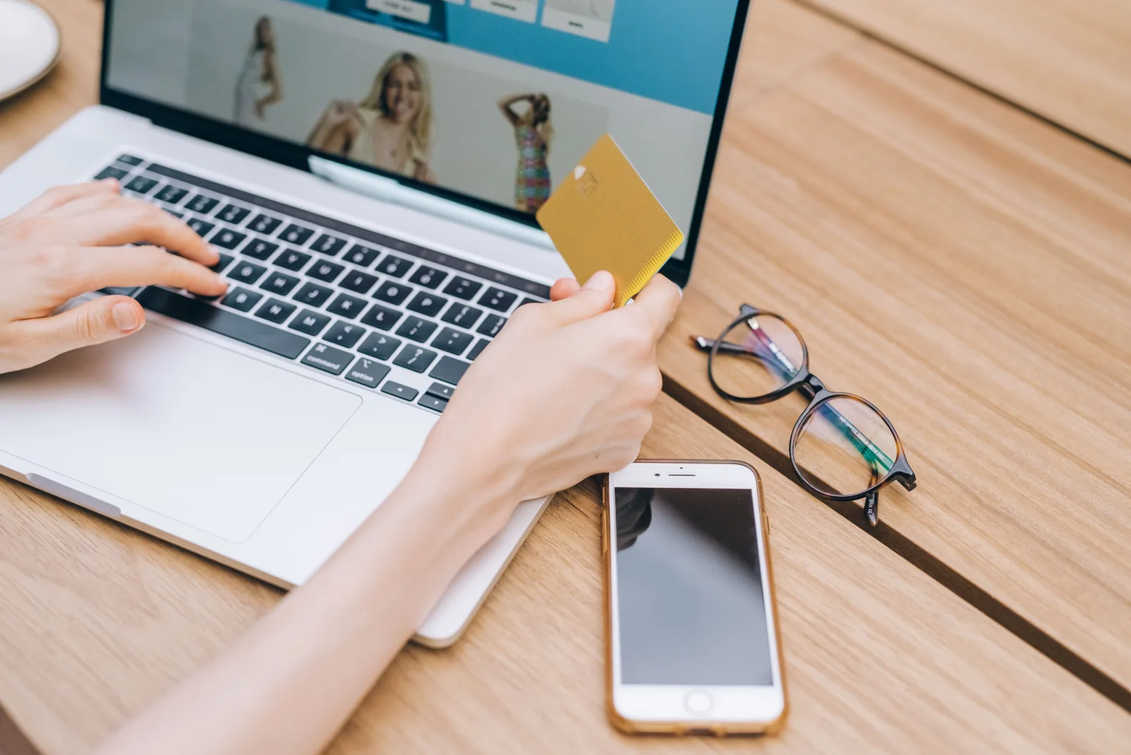 Someone buying a gift online at a laptop